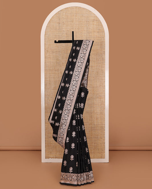 Inky black floral buttas banarasi silk saree, floral creeper zari woven border, and floral jaal design pallu
