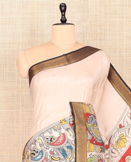 Light Sandal Kalamkari Cotton Saree, Graced with Human Figurine Print, Contrast Traditional Zari Border, Peacock Pallu, and a Contrast Blouse