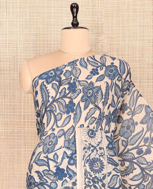 Blue Machine-Printed Kalamkari Cotton Saree Features Floral Vine Design, a Floral Printed Border, Pallu of Musical Instruments, and a Matching Blouse
