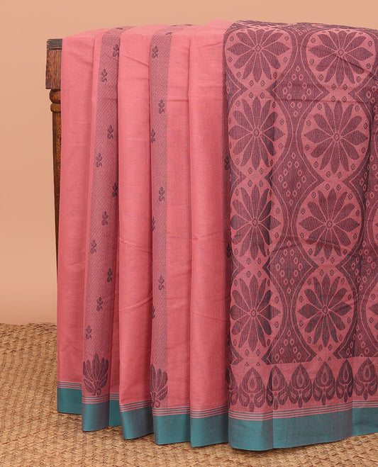 Pink Kanchi Cotton Saree Adorned with Floral-Theme Buttas All Over Its Body, Complemented by a Contrast Border, Pallu Features Flower-Enclosed Circle Patterns, and Paired with a Matching Blouse