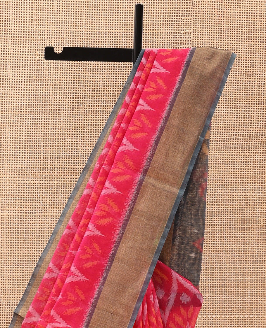 Pink Pochampally Ikkat-style chevron design silk cotton saree, contrast bavanji zari border, and ikkat design pallu