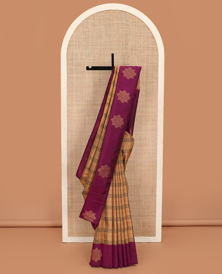Dark sandal burberry-style checked Kanchipuram silk saree, contrast kolam motifs, zari border, and zari design pallu