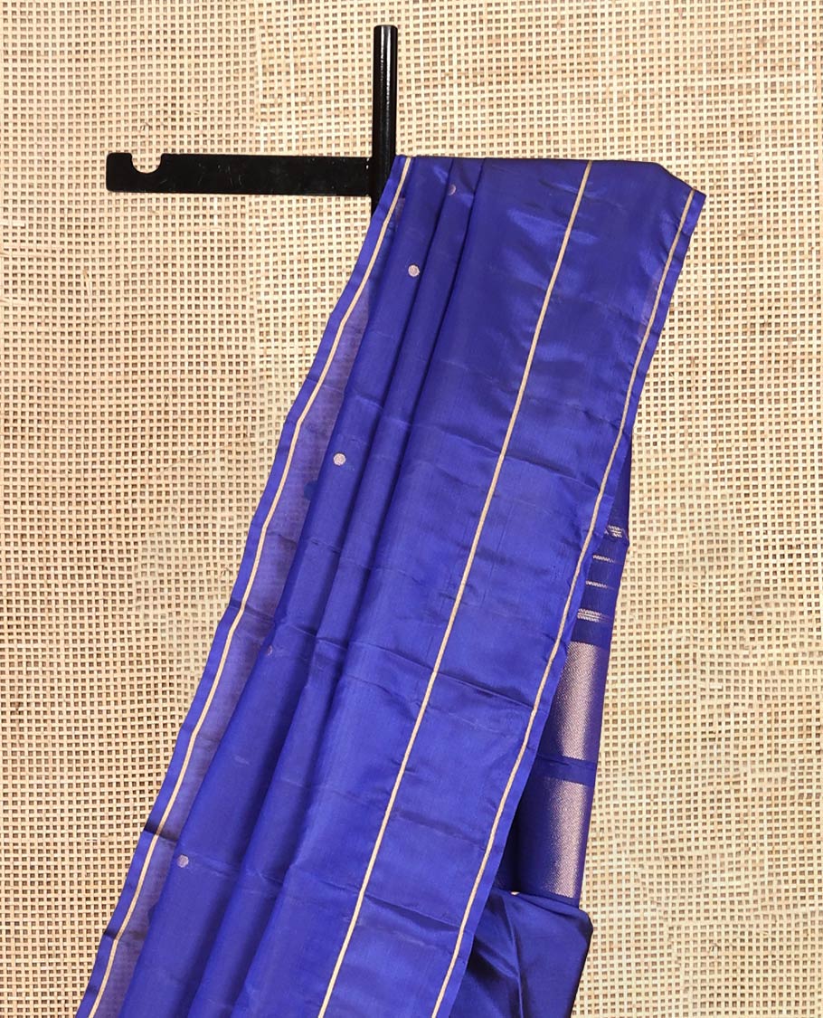 Navy Blue Vasundhara Lite Silk Saree, Subtly Sparkled with Paisa Zari Buttas Across Its Body, Highlighted Zari Border of Horizontal Stripes, Gleaming Pallu of Seppu Rekku Designs, and Paired with a Matching Blouse