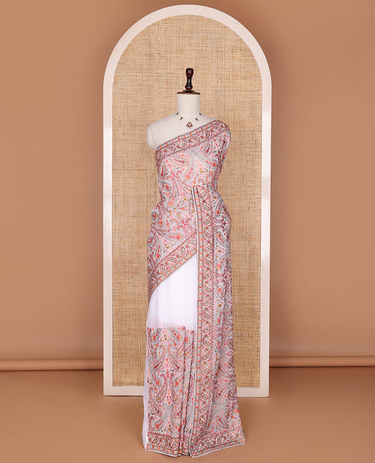 Elegant white floral and paisley vine multi-hue thread embroidered designer saree, thread embroidered border