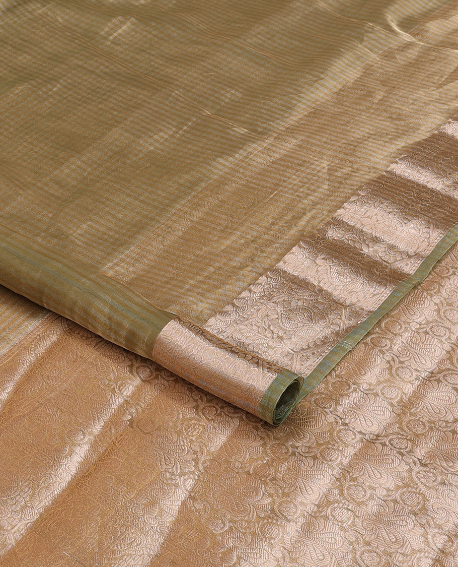 Pastel green sparesely striped tissue saree, Mughal style zari woven border, and intricately zari woven pallu