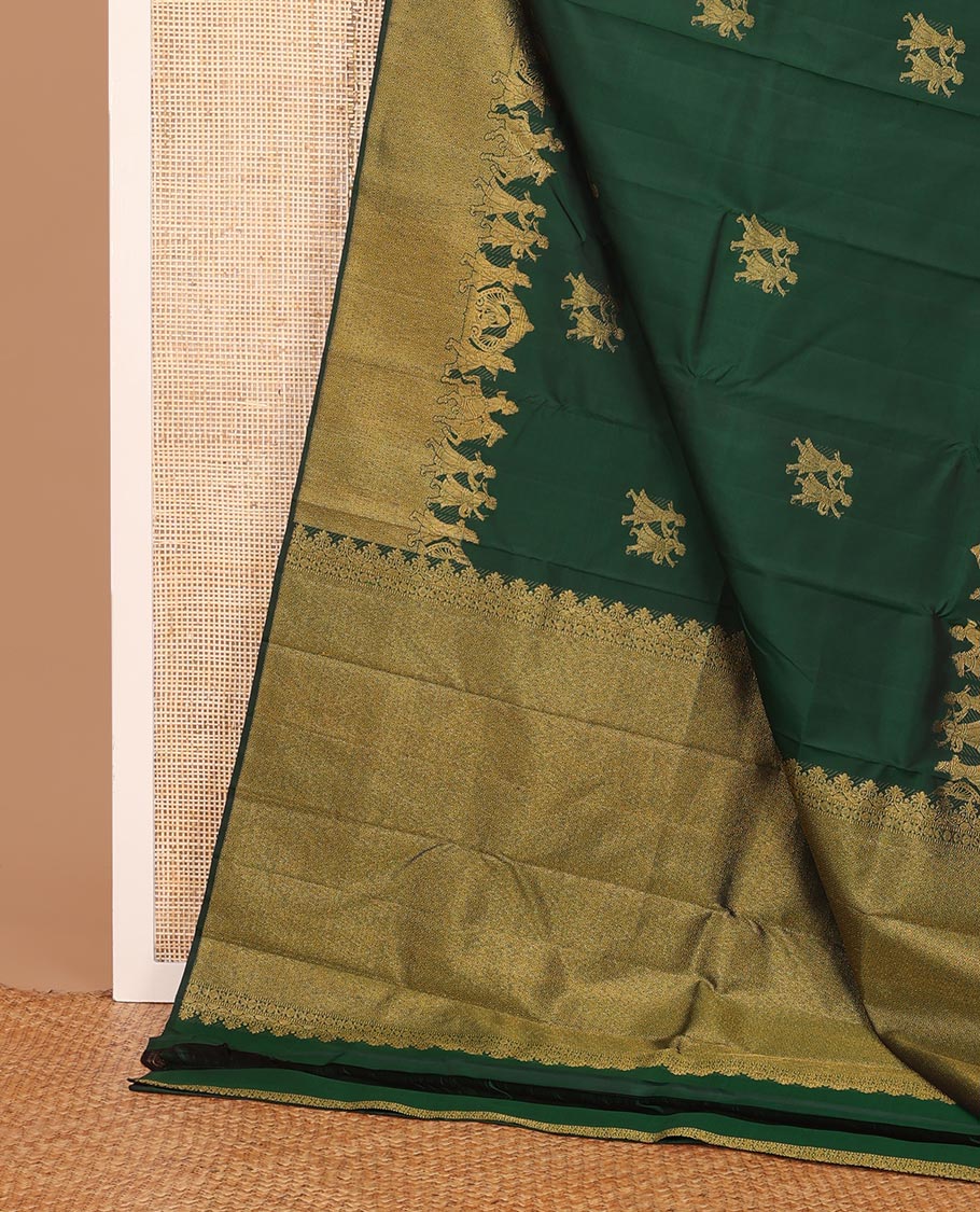 Emerald green human motifs zari woven Kanchipuram silk saree, suyamvaram motifs woven mayil kann border & pallu of mayil kann designs