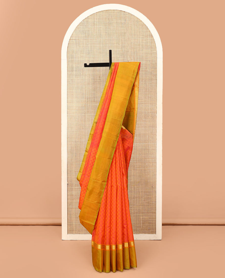 Orange payadi kattam Kanchipuram silk saree, contrast kaal erangina border of rekku, and vanki designs, and zari striped pallu