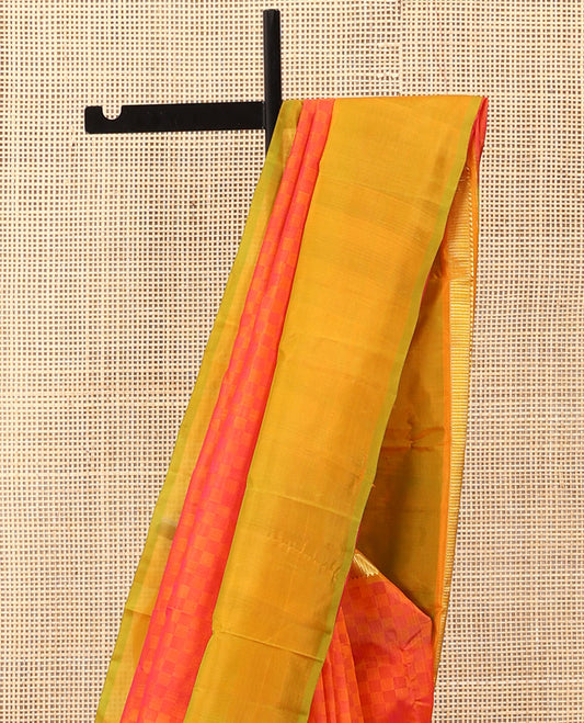 Orange payadi kattam Kanchipuram silk saree, contrast kaal erangina border of rekku, and vanki designs, and zari striped pallu
