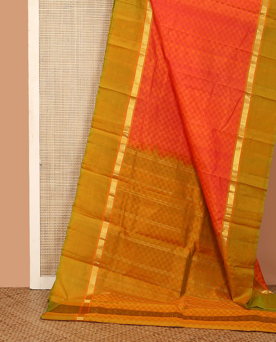 Orange payadi kattam Kanchipuram silk saree, contrast kaal erangina border of rekku, and vanki designs, and zari striped pallu