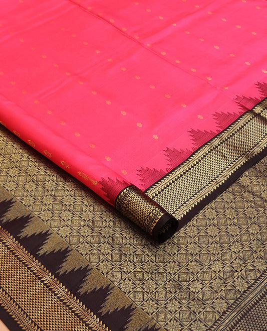 Pink nine-yard silksaree with zari buttas, contrast thazampoo reku border of ara bogudi, muthu & ara maadam & jaal pallu