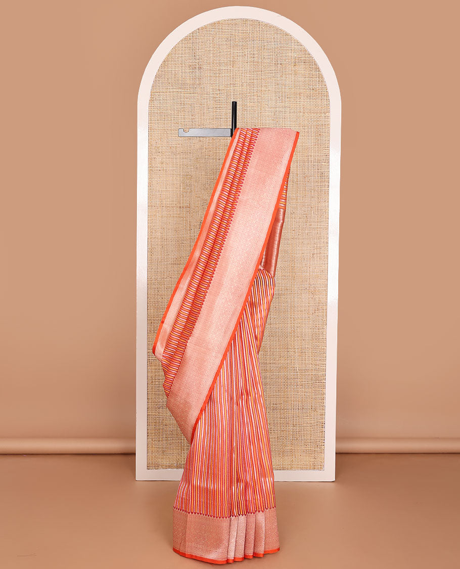 Orange geometric patterns striped organza saree, contrast traditional zari design border & zari-rich intricate pallu