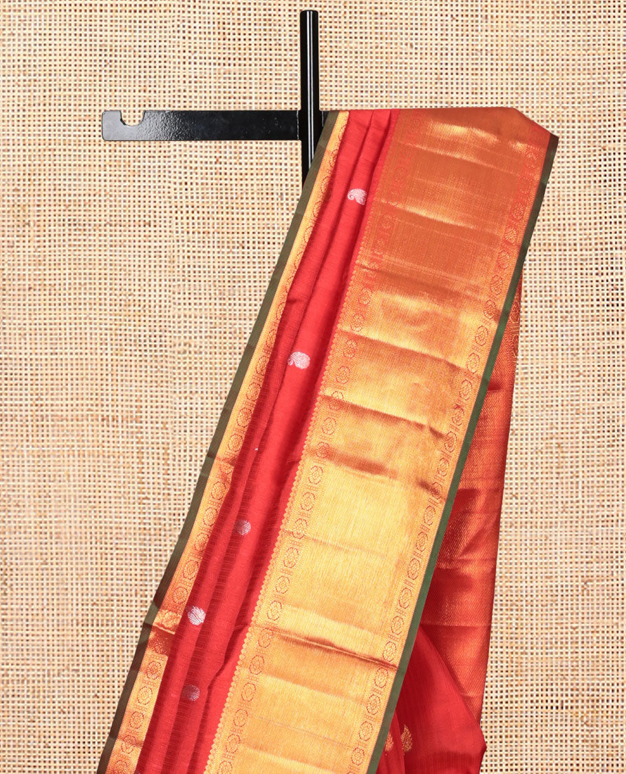 Red Parampara Silk Saree, Embellished with Zari Buttas, a Zari Border of Thilakam Mokku, Muthu, Kathir, and Chakram Designs, Intricate Pallu, and a Matching Blouse