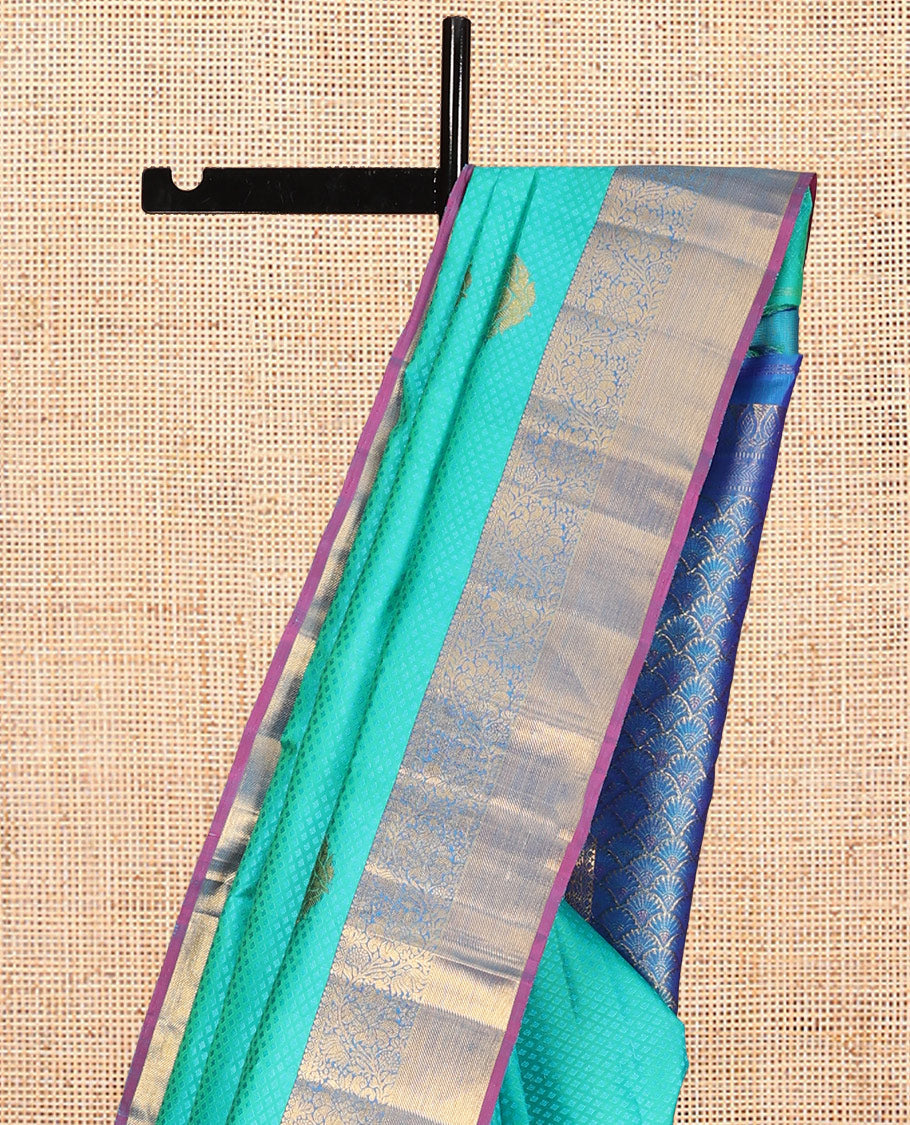 Blue Embossed Parambara Silk Saree, Elevated with Zari Buttas, a Contrast Border of Kodi Visiry Designs, Pallu of Scallop Design, and Contrast Blouse