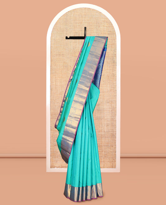 Blue Embossed Parambara Silk Saree, Elevated with Zari Buttas, a Contrast Border of Kodi Visiry Designs, Pallu of Scallop Design, and Contrast Blouse