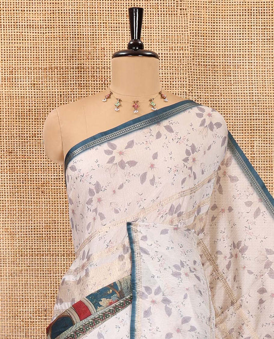 Blue floral, elephant, and ancient scenery printed Moss crush saree, piping border, elephant motif printed pallu, and contrast printed blouse