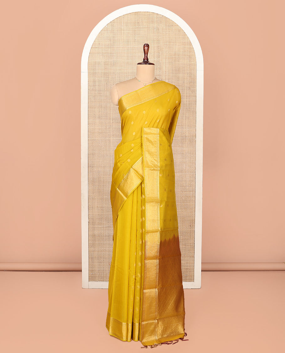 Yellow Silk Cotton Saree, Subtly Woven with Buttas All Over Its Body, Highlighted by Zari Border, Diagonally Woven Pallu and Paired with a Matching Blouse