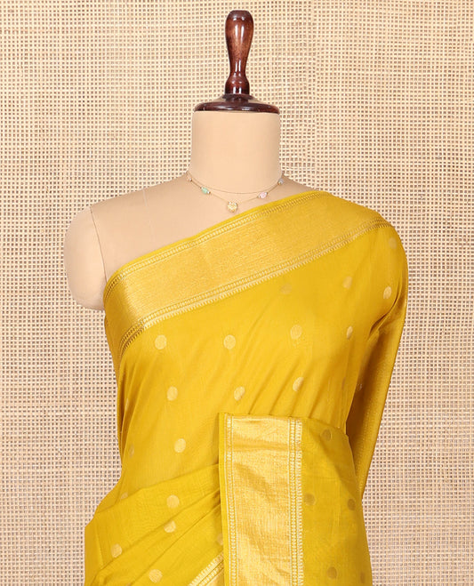Yellow Silk Cotton Saree, Subtly Woven with Buttas All Over Its Body, Highlighted by Zari Border, Diagonally Woven Pallu and Paired with a Matching Blouse