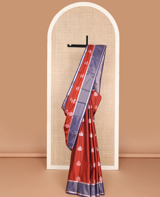Red shade semi-soft silk saree with zari buttas, contrast zari stripes border & zari-rich jaal pallu