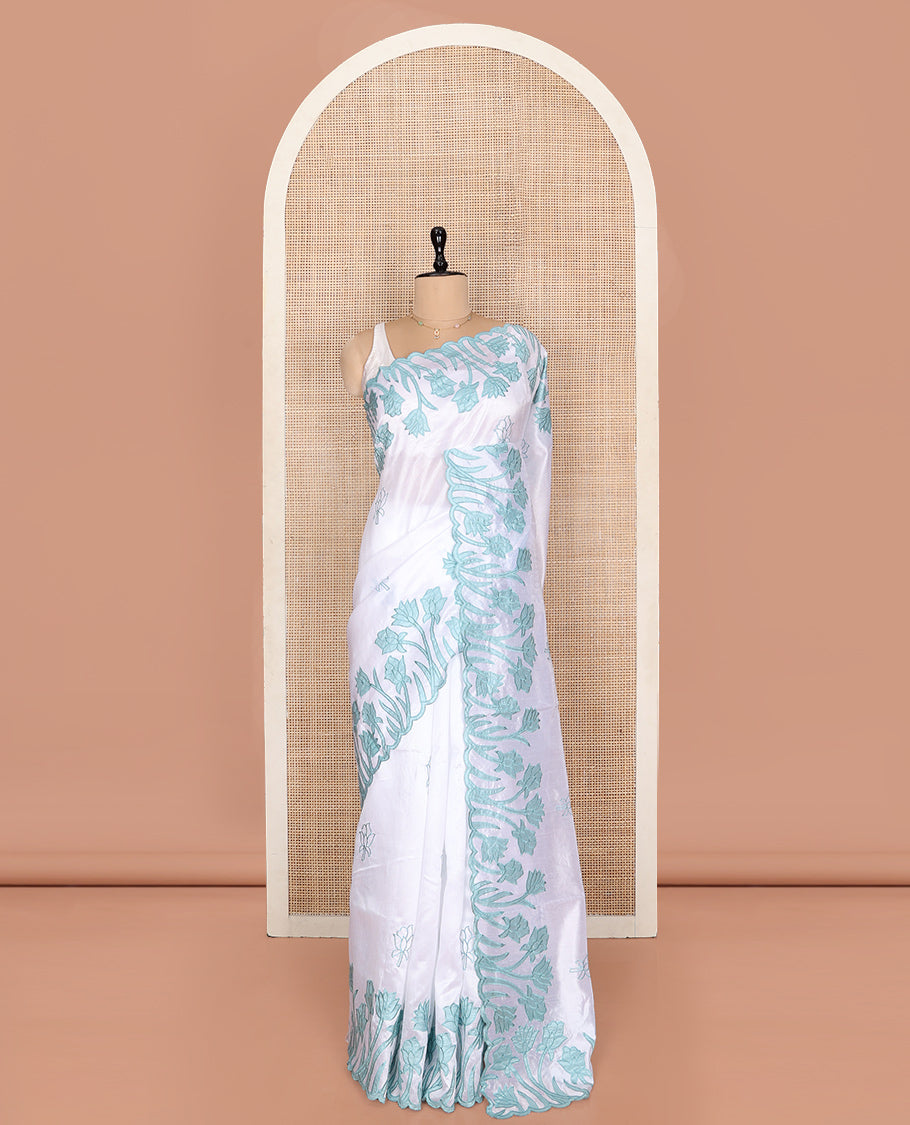 White Fancy Tussar Saree, Elegantly Highlighted with Floral Vine Embroidery, a Scallop Border, and a Matching Blouse