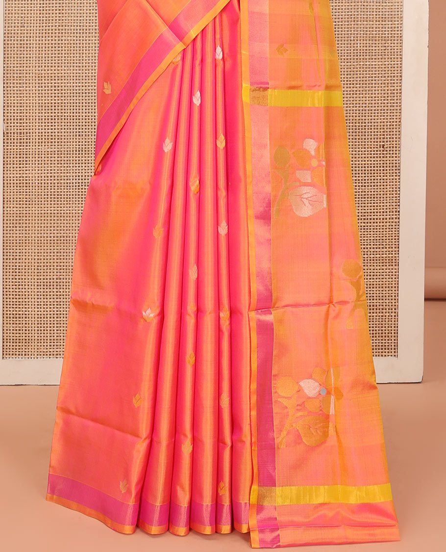 Orange Uppada Silk Saree Decorated with Zari Buttas, Complemented by Bavanji Border, Pallu Depicting Floral Motifs, and Paired with a Matching Blouse