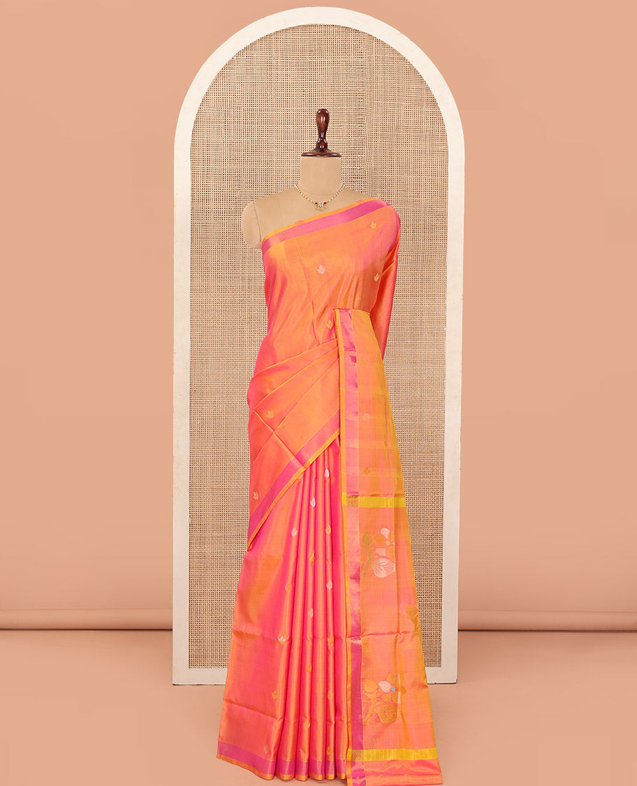 Orange Uppada Silk Saree Decorated with Zari Buttas, Complemented by Bavanji Border, Pallu Depicting Floral Motifs, and Paired with a Matching Blouse
