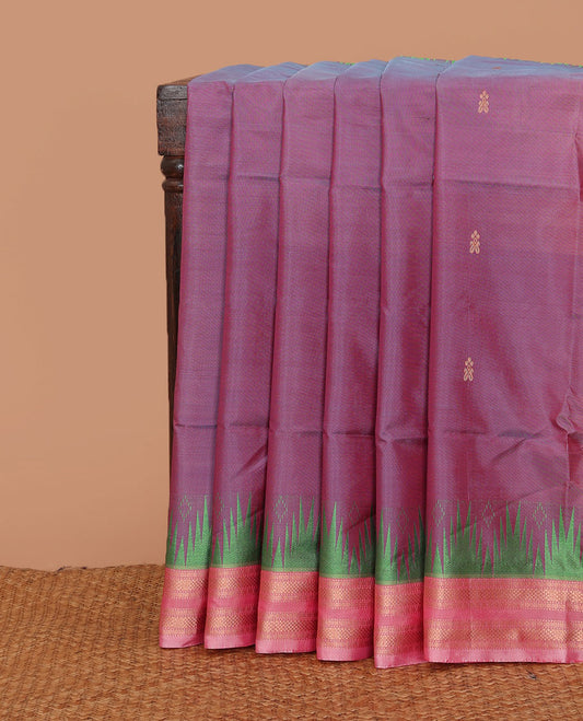 Purple buttas banana pith saree, contrast temple traditional zari border, and pallu of stripes, and buttas