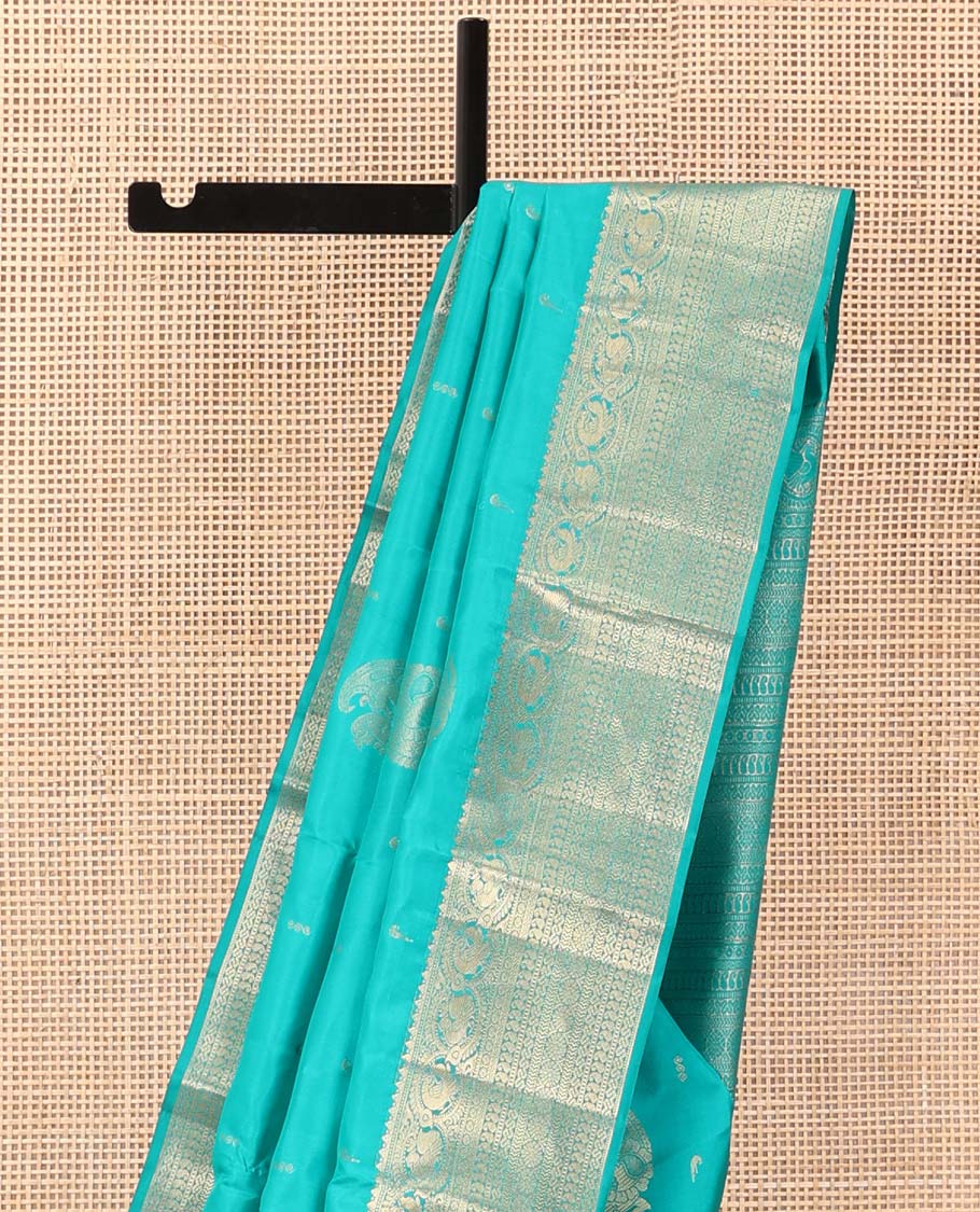 Blue zari buttas silk saree, zari border and pallu steeped with rekku, mayil, rudraksham, manga, kathir, cross neli and laddu kamalam