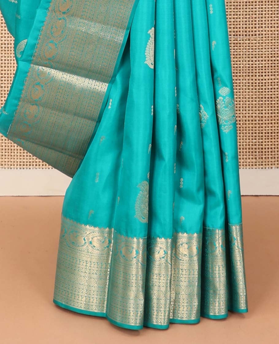 Blue zari buttas silk saree, zari border and pallu steeped with rekku, mayil, rudraksham, manga, kathir, cross neli and laddu kamalam