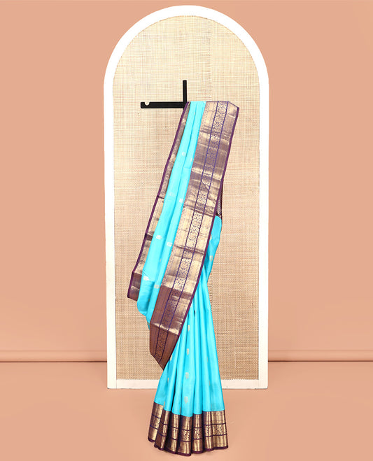 Blue Vasundhara Silk Saree, Adorned with Zari Buttas All Over Its Body, Complemented by Contrast Border of Mayil Kann And Kodi Visiry Designs, Grand Pallu and Paired with a Contrast Blouse