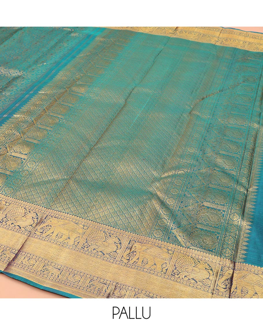 Blue Kanchipuram Wedding Silk Saree, Spotlighted with Jacquard Design Weave, Highlighted by Zari Border of Thilakam Mokku, Muthu, Banaras, Rudraksham, Mayil, Yaanai, and Vanki Designs, Grand Jaal Pallu, and Paired with a Matching Blouse
