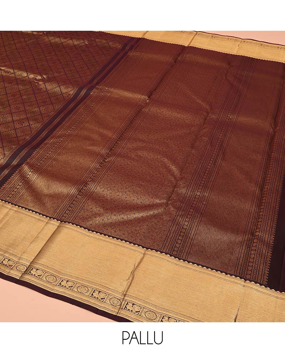 Brown Kanchipuram Wedding Silk Saree, Decked Up with Jacquard Design On Its Body, Highlighted by Zari Border of Rekku, Mayil and Chakram Designs, Grand Jaal Pallu and Paired with a Matching Blouse