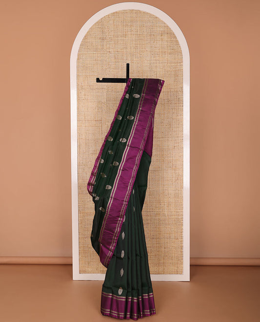 Dark green floral motifs uppada saree with contrast zari border & argyle design pallu