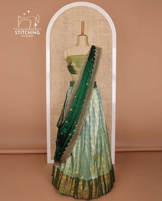 Mint green argyle design banaras half saree with contrast zari design border & zari design blouse & floral embroidered dhavani