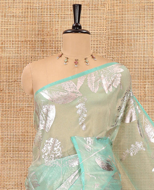 Borderless blue tropical floral-leaf motifs foil printed glass tissue saree, tropical floral-leaf theme foil printed pallu