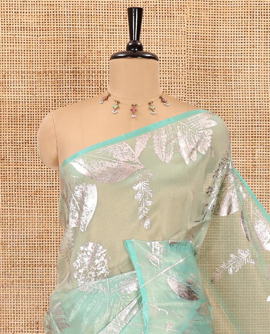 Borderless blue tropical floral-leaf motifs foil printed glass tissue saree, tropical floral-leaf theme foil printed pallu