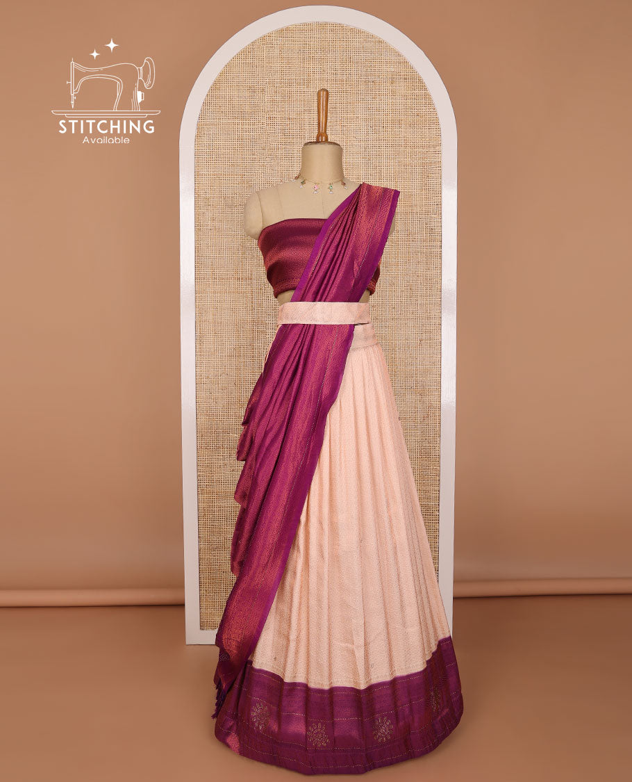 Baby pink banaras half saree with contrast floral buttas border, plain blouse & striped dhavani