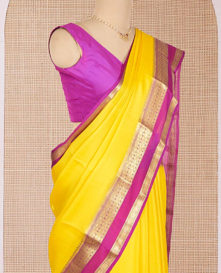 Kesar Yellow Plain Mysore Silk Saree, Complemented by a Contrast Temple Border of Jaal Designs, Pallu Steeped with Zari Stripes, and Paired with a Contrast Blouse