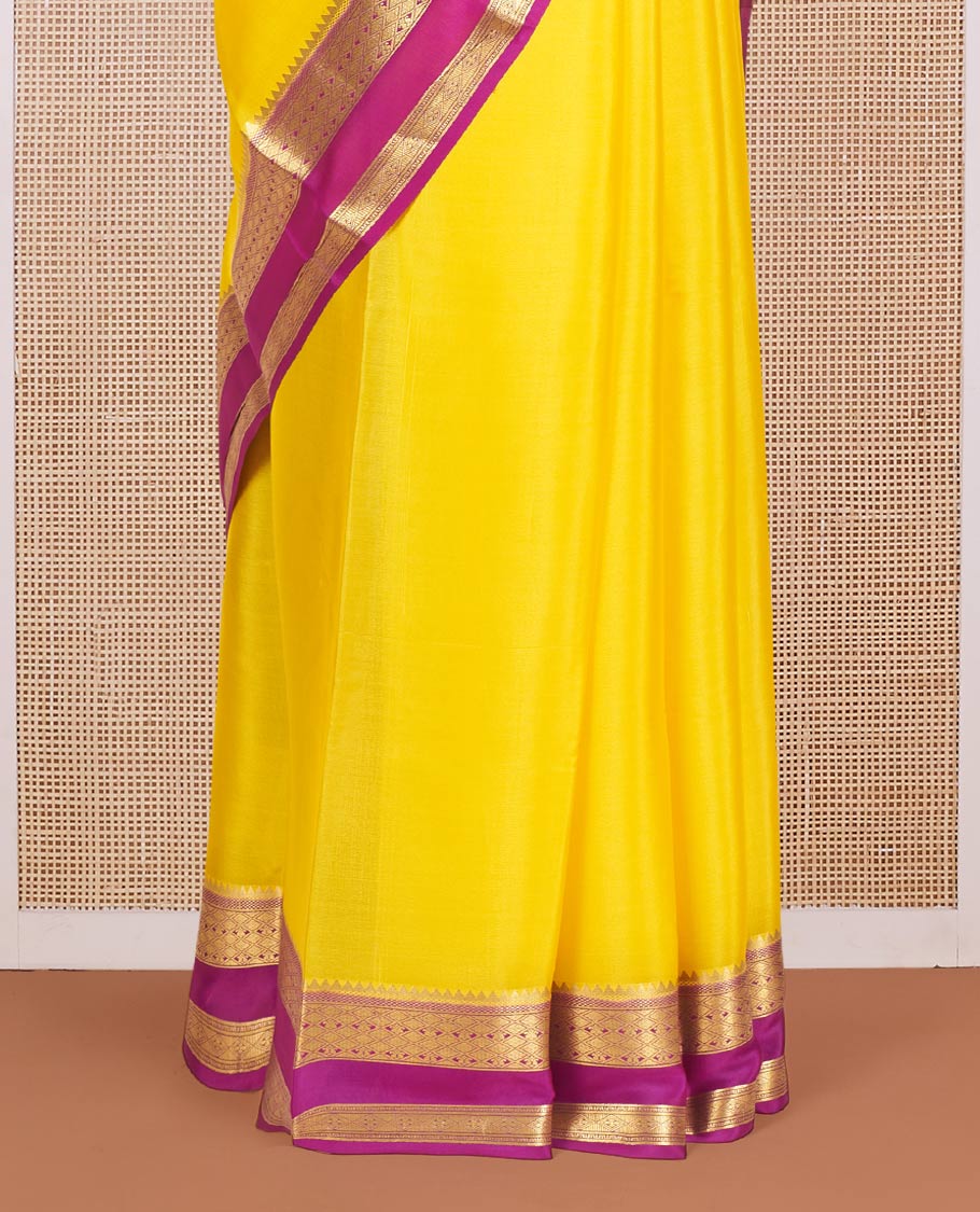 Kesar Yellow Plain Mysore Silk Saree, Complemented by a Contrast Temple Border of Jaal Designs, Pallu Steeped with Zari Stripes, and Paired with a Contrast Blouse