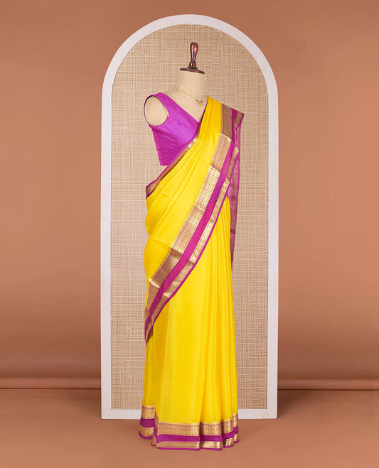 Kesar Yellow Plain Mysore Silk Saree, Complemented by a Contrast Temple Border of Jaal Designs, Pallu Steeped with Zari Stripes, and Paired with a Contrast Blouse