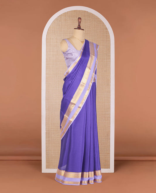 Violet Plain Mysore Silk Saree, Complemented by a Contrast Temple Border of Jaal Designs, Pallu Steeped with Zari Stripes, and Paired with a Contrast Blouse