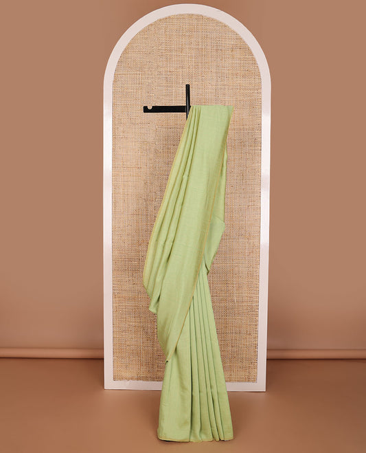 Borderless pista green  kamala silk saree with contrast floral design blouse