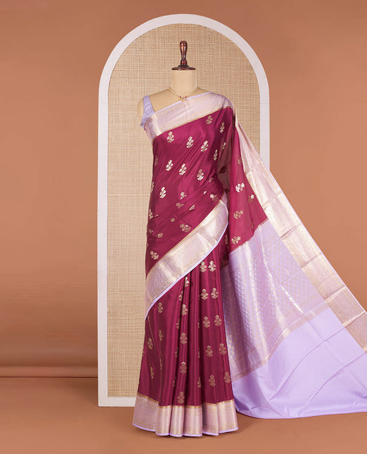Maroon Mysore Silk Saree Enthralled with Floral Zari Buttas, Complemented by a Contrast Border Featuring Floral Creeper and Jaal Designs, Gleaming Zari Pallu of Jaal Designs, and Paired with a Contrast Blouse