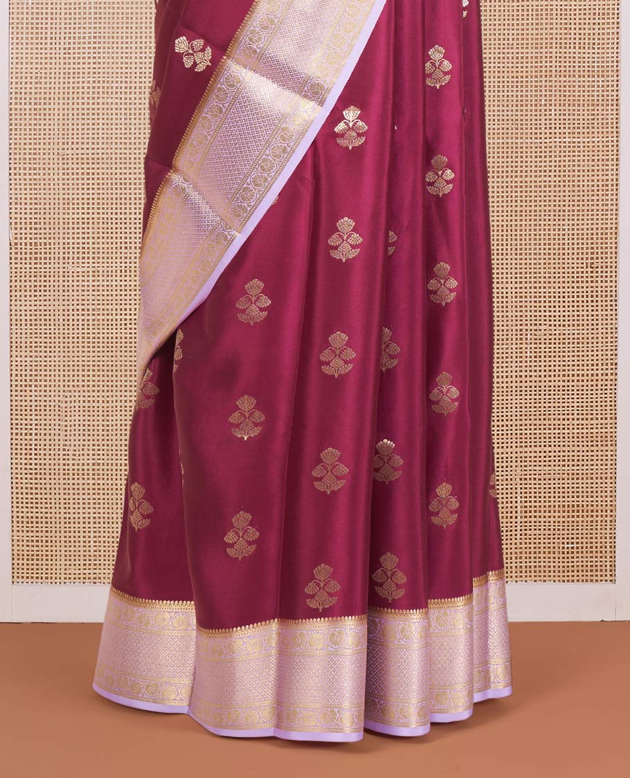 Maroon Mysore Silk Saree Enthralled with Floral Zari Buttas, Complemented by a Contrast Border Featuring Floral Creeper and Jaal Designs, Gleaming Zari Pallu of Jaal Designs, and Paired with a Contrast Blouse