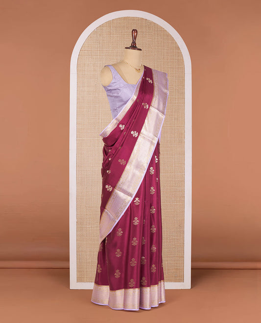 Maroon Mysore Silk Saree Enthralled with Floral Zari Buttas, Complemented by a Contrast Border Featuring Floral Creeper and Jaal Designs, Gleaming Zari Pallu of Jaal Designs, and Paired with a Contrast Blouse