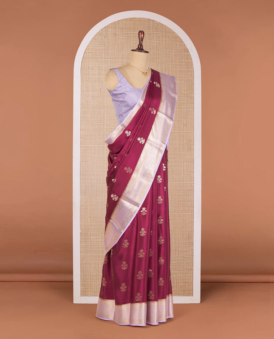 Maroon Mysore Silk Saree Enthralled with Floral Zari Buttas, Complemented by a Contrast Border Featuring Floral Creeper and Jaal Designs, Gleaming Zari Pallu of Jaal Designs, and Paired with a Contrast Blouse