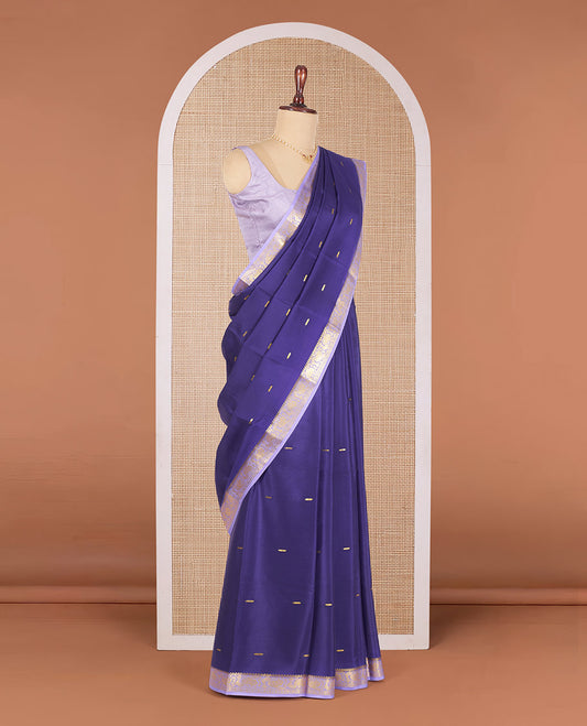 Blue Mysore Silk Saree Highlighted with Zari Buttas, Complemented by a Contrast Border Featuring Floral Designs, Pallu Featuring Zari Designs, and Paired with a Contrast Blouse