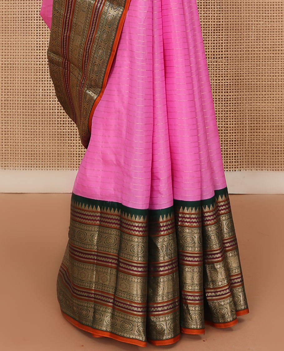 Rose milk pink zari striped Kanchipuram silk saree, contrast jaal pallu, and border of thazampoo rekku,rettai neli, rudraksham, and chakram motifs