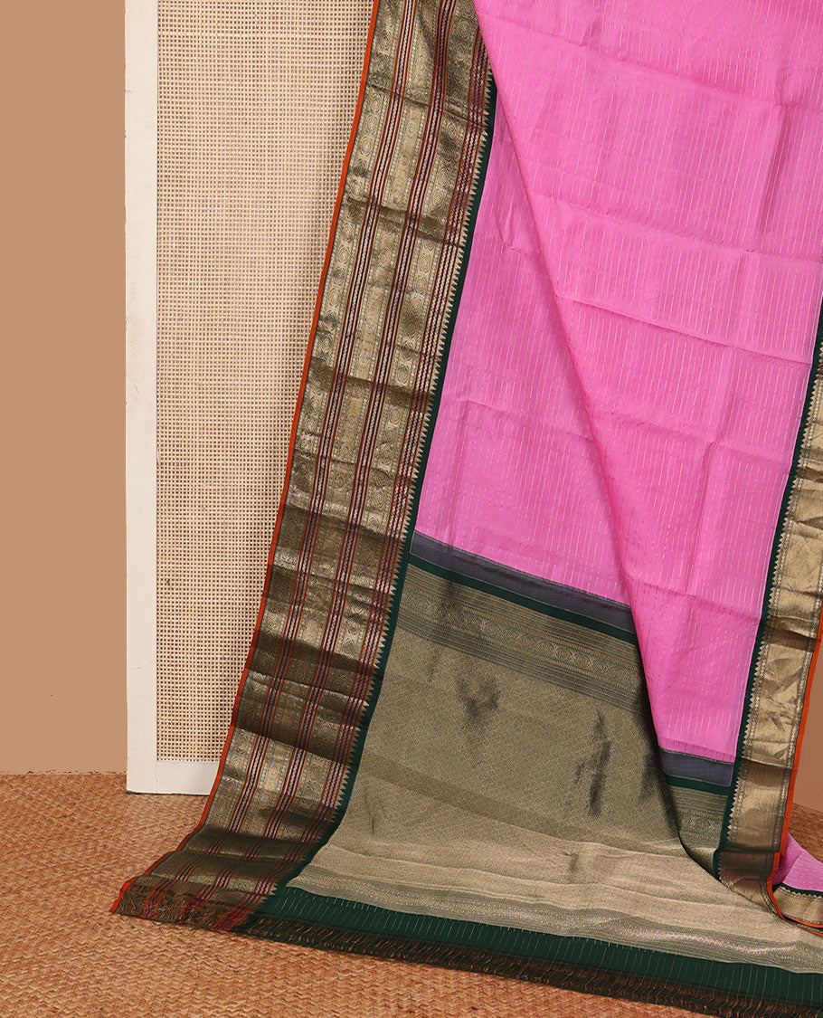 Rose milk pink zari striped Kanchipuram silk saree, contrast jaal pallu, and border of thazampoo rekku,rettai neli, rudraksham, and chakram motifs