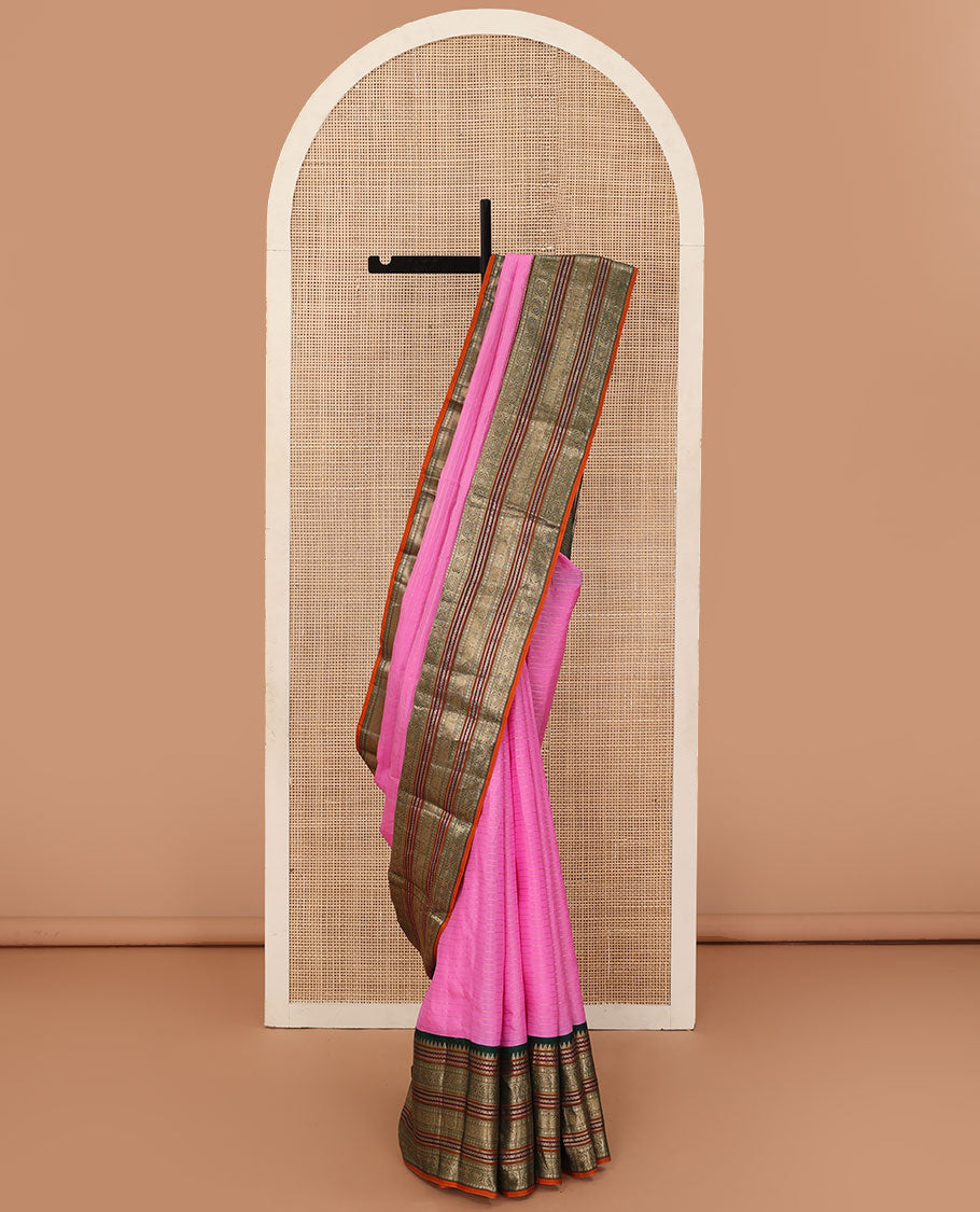 Rose milk pink zari striped Kanchipuram silk saree, contrast jaal pallu, and border of thazampoo rekku,rettai neli, rudraksham, and chakram motifs