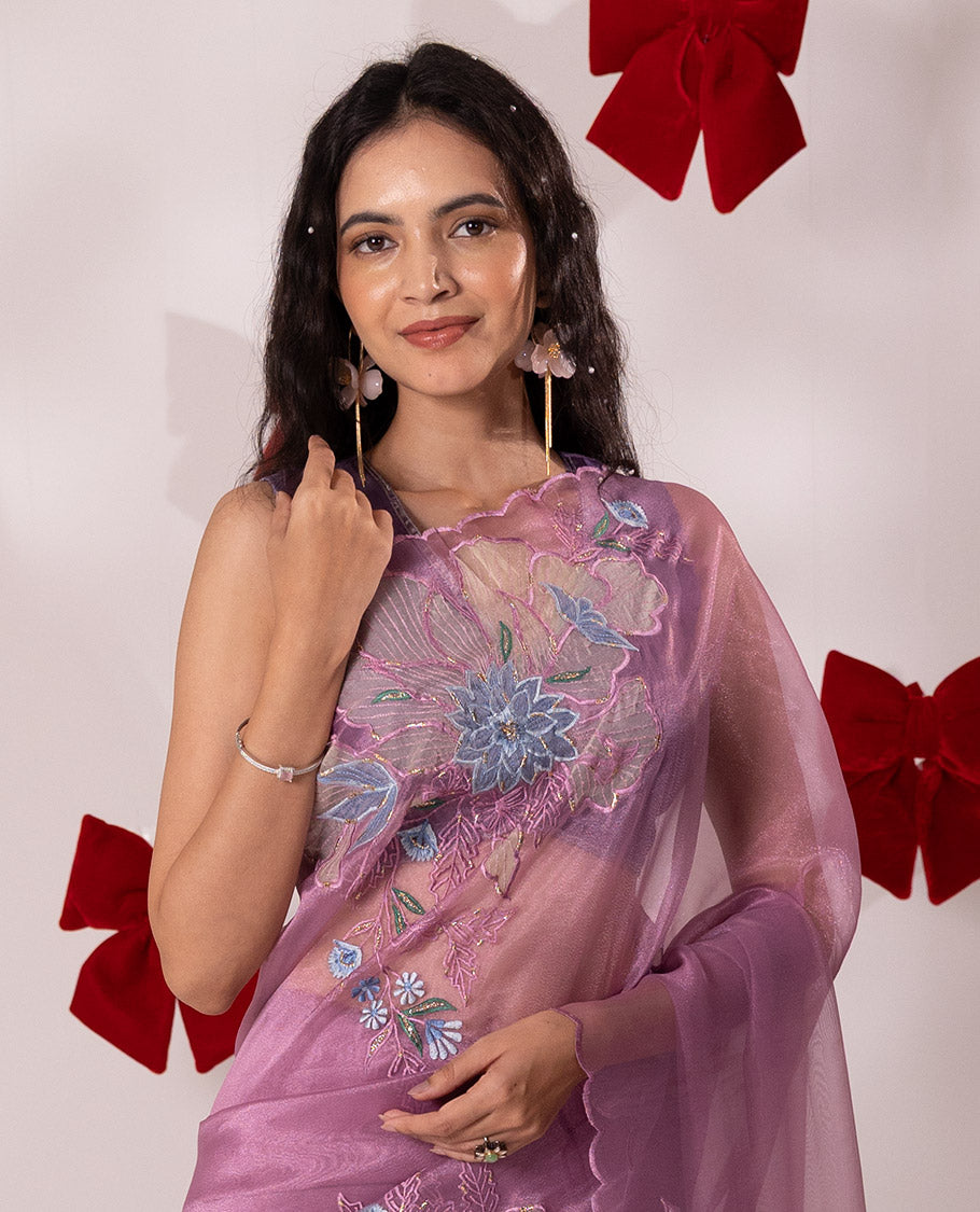 Pink floral embroidered with golden outlined organza saree, scallop border, and floral embroidered pallu